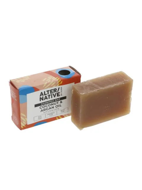Shampoo bar with coconut and argan oil, packaging beside.