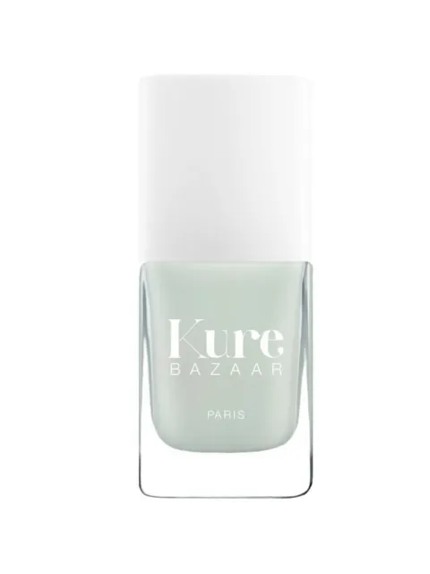 Kure Bazaar nail polish bottle with white cap and light green shade.