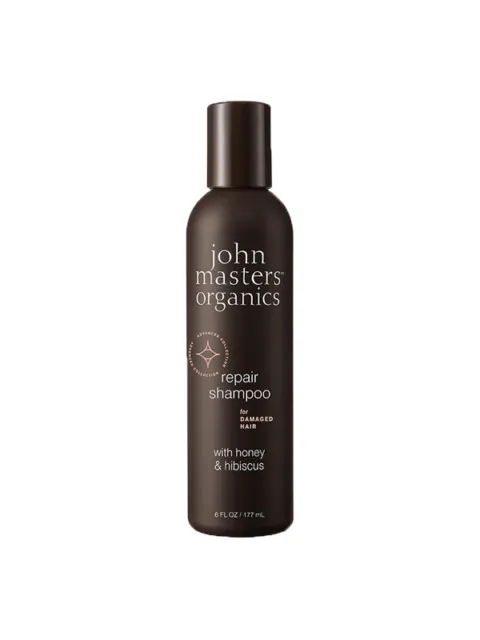 Brown bottle of John Masters Organics repair shampoo, 177 ml, with honey and hibiscus.