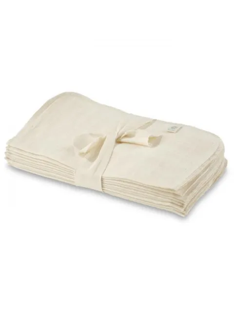 Stack of cream-coloured muslin cloths tied with a ribbon.