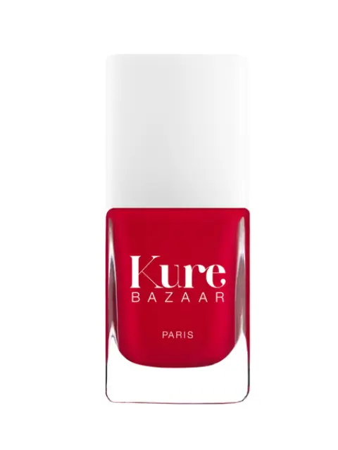 Kure Bazaar red nail polish bottle with white cap.