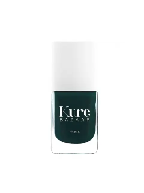 Kure Bazaar nail polish bottle with dark green colour and white cap.