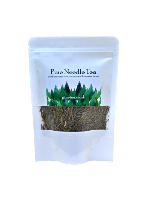 Pine Needle Tea in a white pouch with forest design and website pinetea.co.uk.