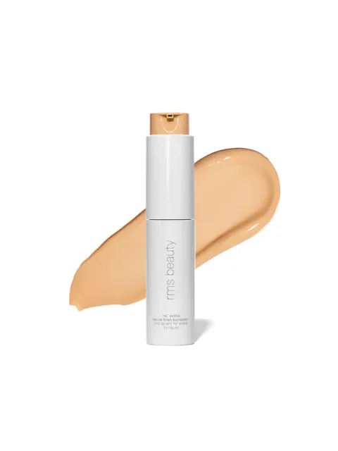 RMS Beauty foundation bottle with beige swatch behind.