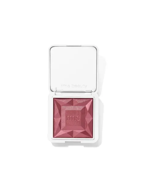 Open compact with pink blush, embossed "rms beauty" on lid.