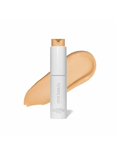 RMS Beauty foundation bottle with beige liquid swatch in background.