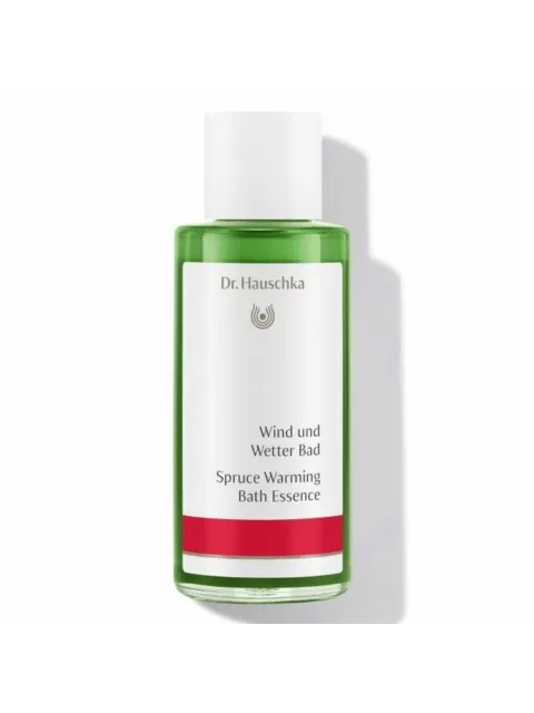 Dr. Hauschka Spruce Warming Bath Essence in a green bottle with white cap.
