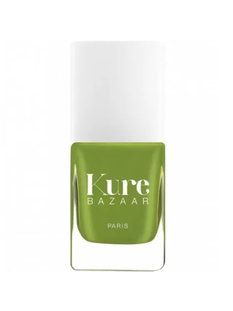 Green nail polish bottle with "Kure Bazaar Paris" text.