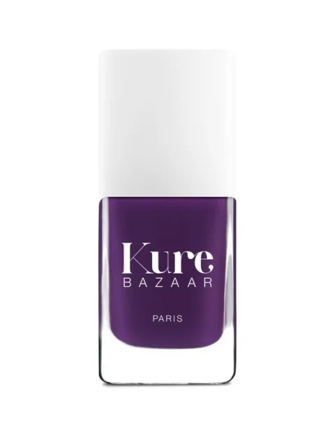 Kure Bazaar purple nail polish bottle with white cap.