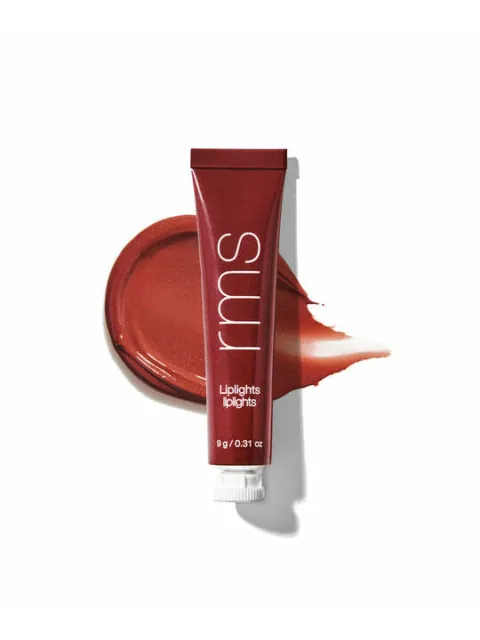 Red tube of rms Liplights with swatch on white background.