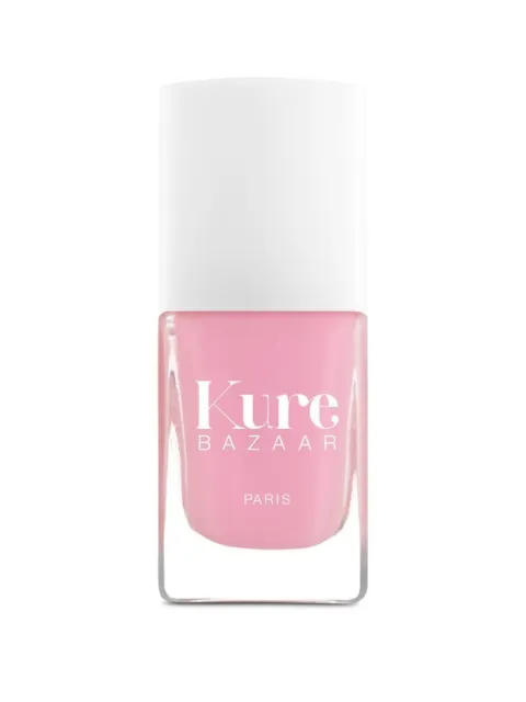 Kure Bazaar pink nail polish bottle with white cap.
