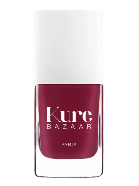 Kure Bazaar nail polish bottle with white cap and red colour.