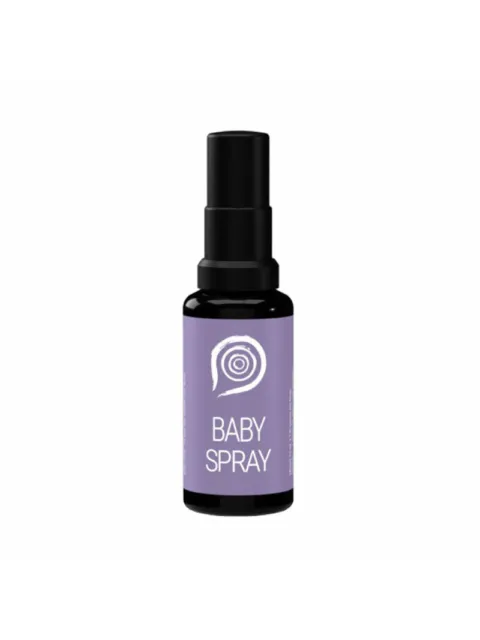 Purple bottle labelled "Baby Spray" with a spiral design.