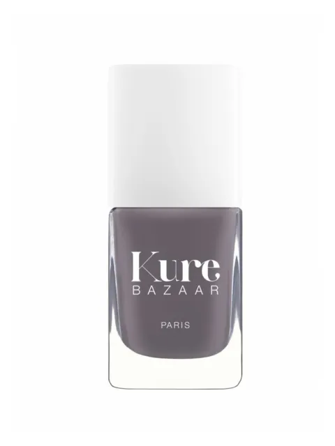 Kure Bazaar nail polish bottle with grey colour and white cap.