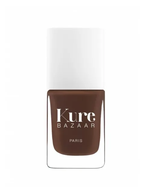 Kure Bazaar brown nail polish bottle with white cap.