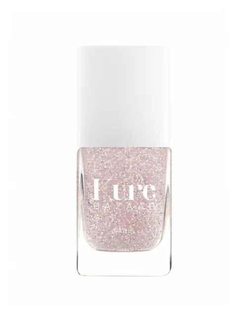 Kure Bazaar glitter nail polish bottle with white cap.
