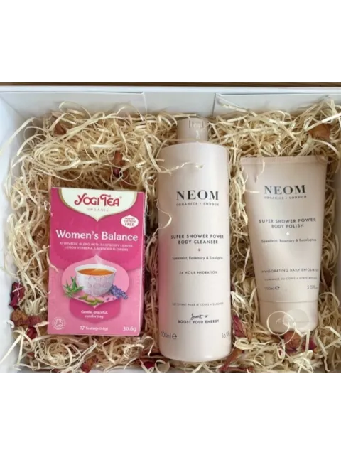 Yogi Tea Women's Balance, Neom body cleanser and polish in a gift box with straw filling.