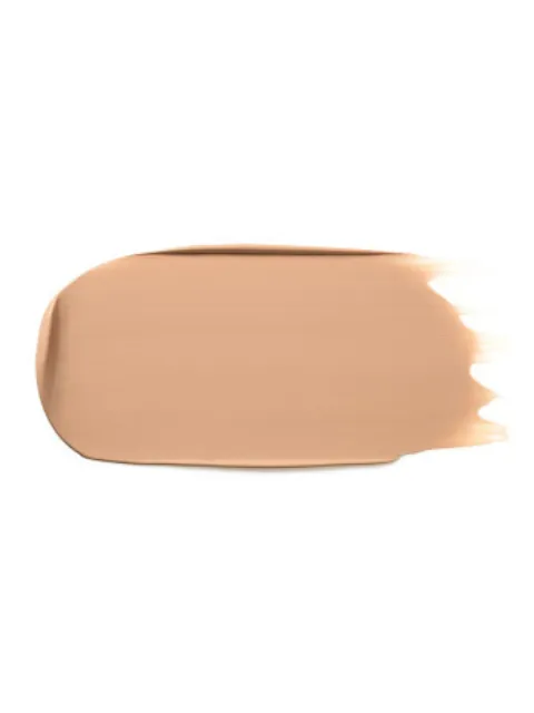 Beige foundation smear on white background.