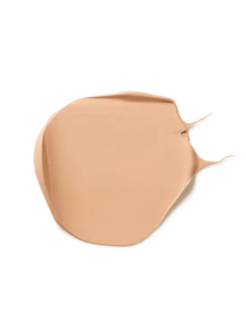 Beige cream smear on white background.
