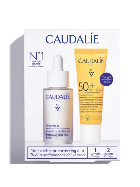 Caudalie dark spot serum and SPF 50+ cream duo in packaging.