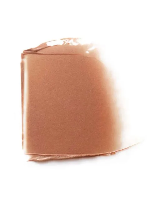 Bronze cream swatch with smooth texture on white background.
