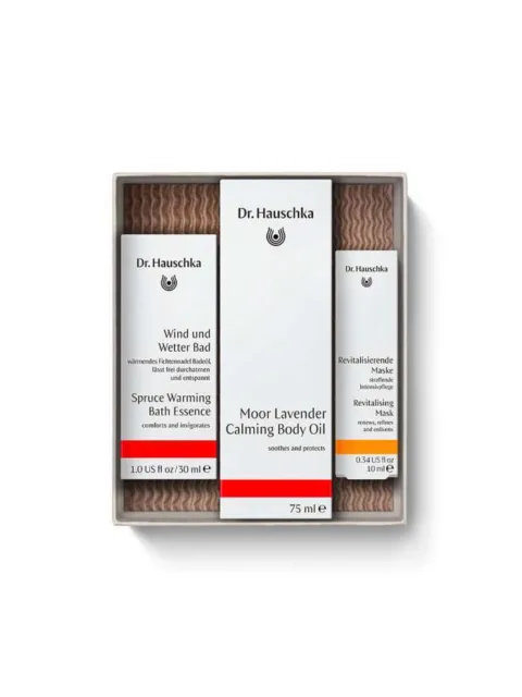 Dr. Hauschka gift set with bath essence, body oil, and revitalising mask in a box.