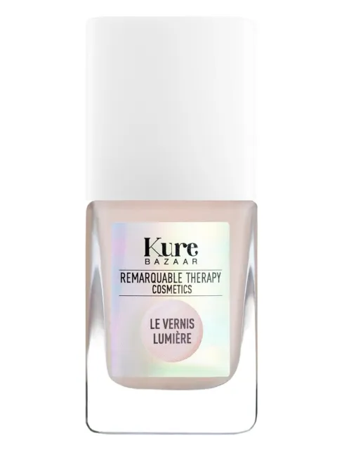 Kure Bazaar nail polish, Le Vernis Lumière, in a square bottle with a white cap.