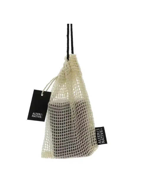 Bar of soap in a mesh bag with "ALTER/NATIVE" label attached.