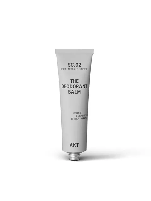 Grey tube labelled "The Deodorant Balm" with cedar, eucalyptus, bitter orange.