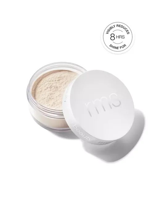 Open jar of RMS Beauty powder with lid beside it. Text: "Visibly reduces shine for 8 hrs".