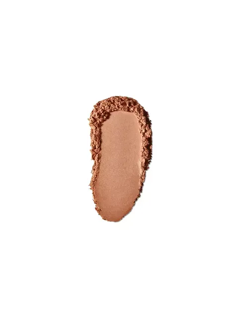 Brown powder swatch on white background.