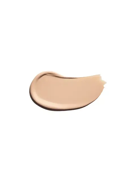 Beige foundation smear on white background.
