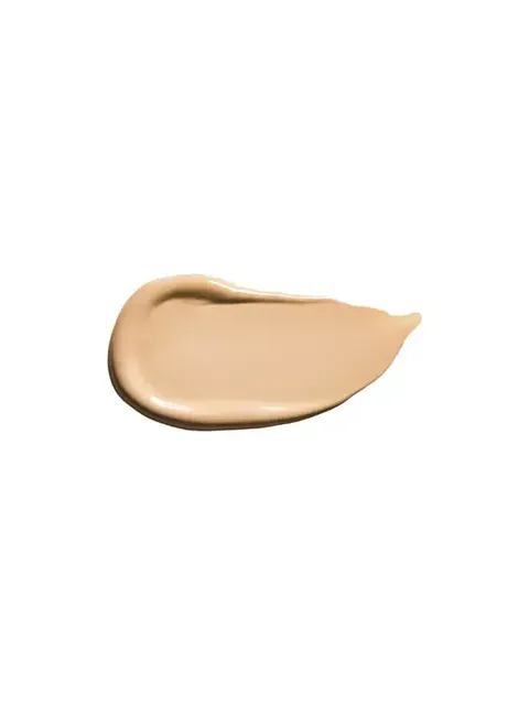Beige cream foundation smear on white background.