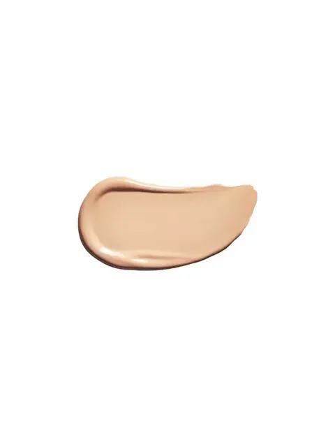 Beige foundation smear on white background.