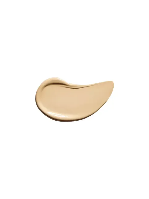 Beige cream smear on white background.