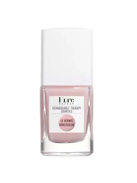 Pink nail polish bottle with white cap, labelled "Kure Bazaar" and "Le Vernis Durcisseur".