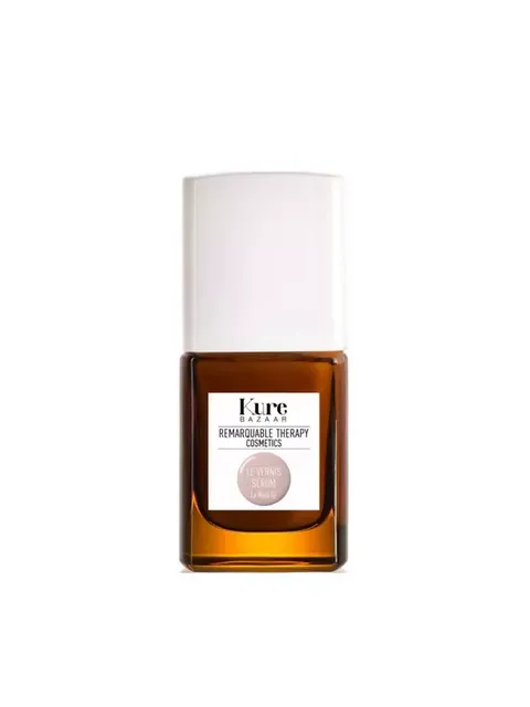 Brown bottle with white cap, labelled "Kure Bazaar Remarkable Therapy Cosmetics".