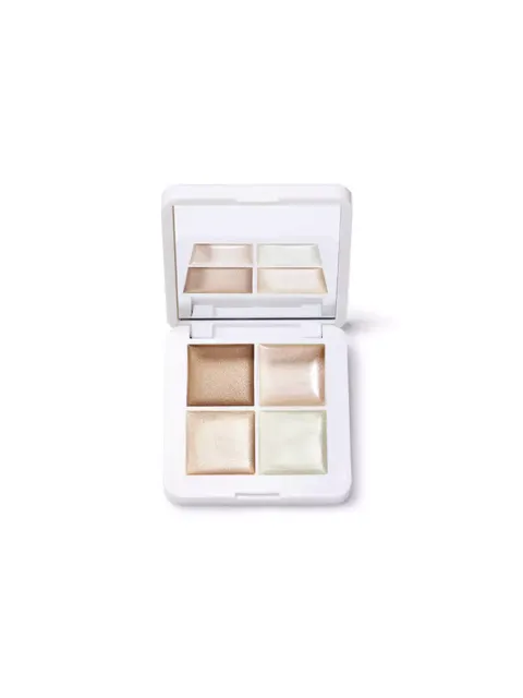 Open compact with four shimmery cream shades and a mirror.