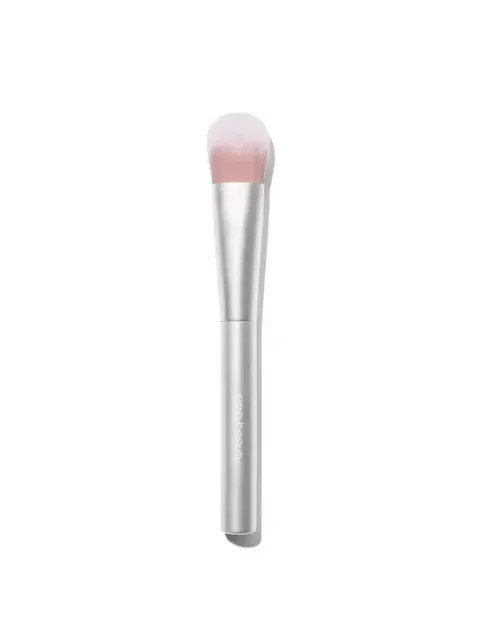Silver makeup brush with pink bristles on a white background.