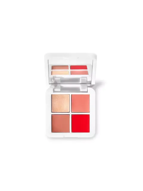 Open compact with four shades of blush in a white case.