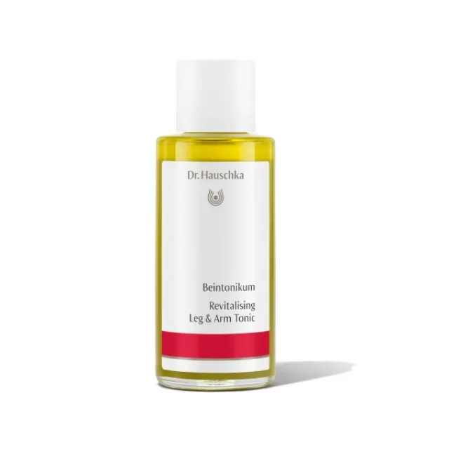 Dr. Hauschka Revitalising Leg & Arm Tonic bottle with red label.