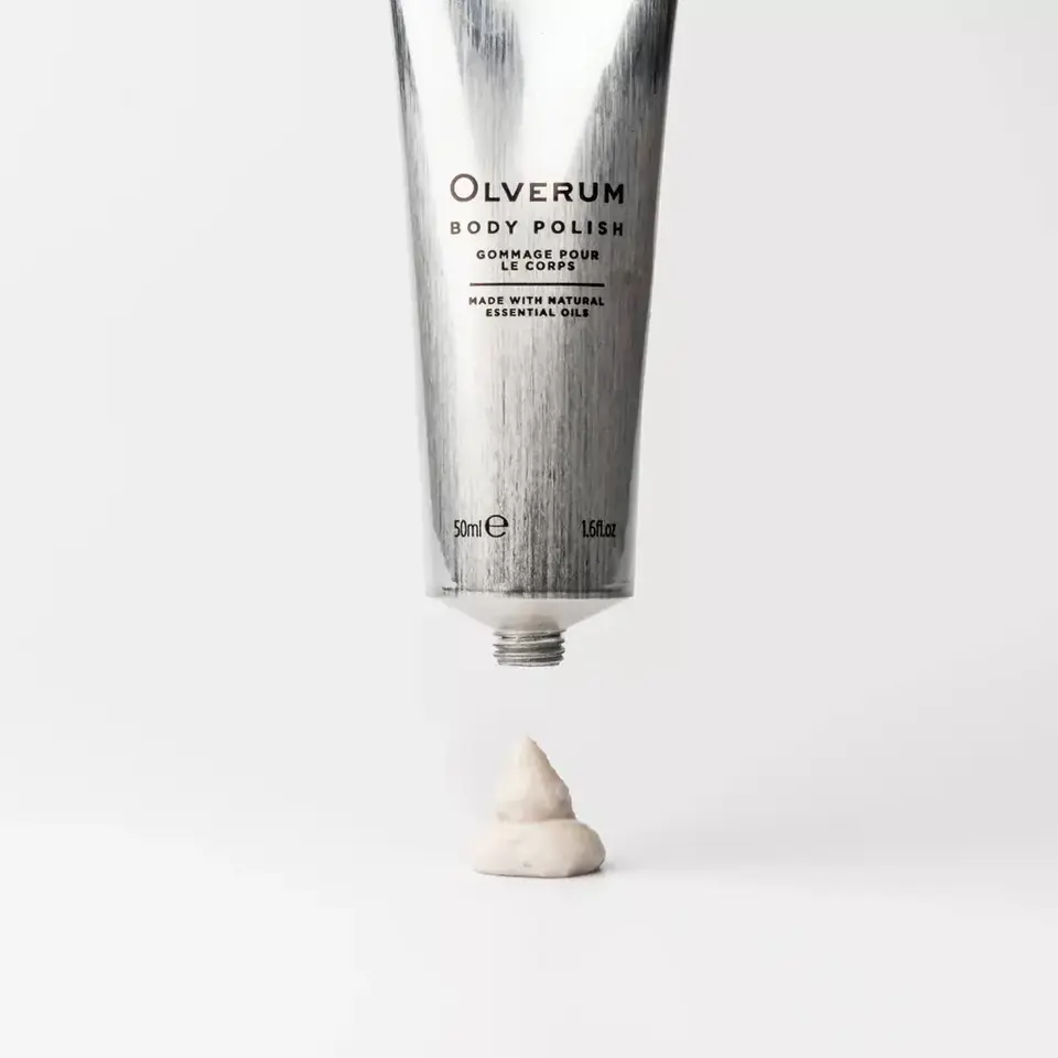 Olverum Body Polish tube with cream on white background. 50ml, made with natural essential oils.