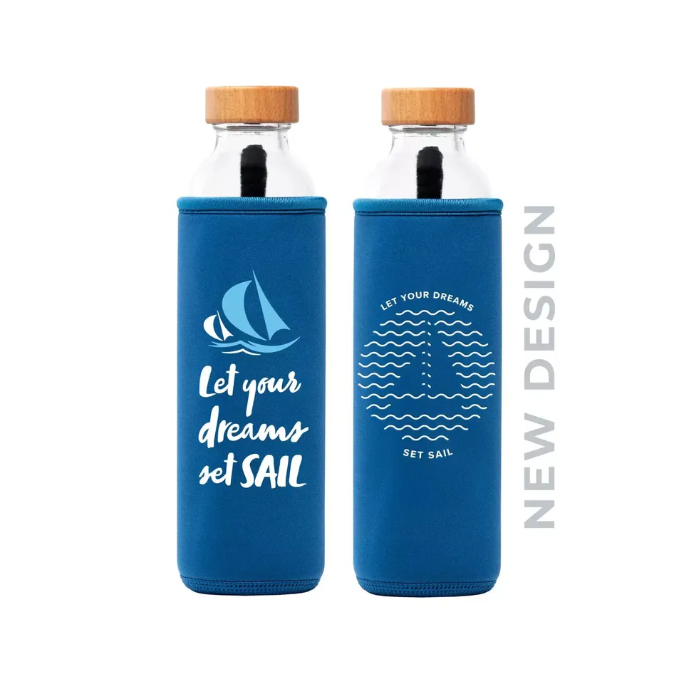 Two blue bottles with "Let your dreams set sail" text and sailboat design. New design label.