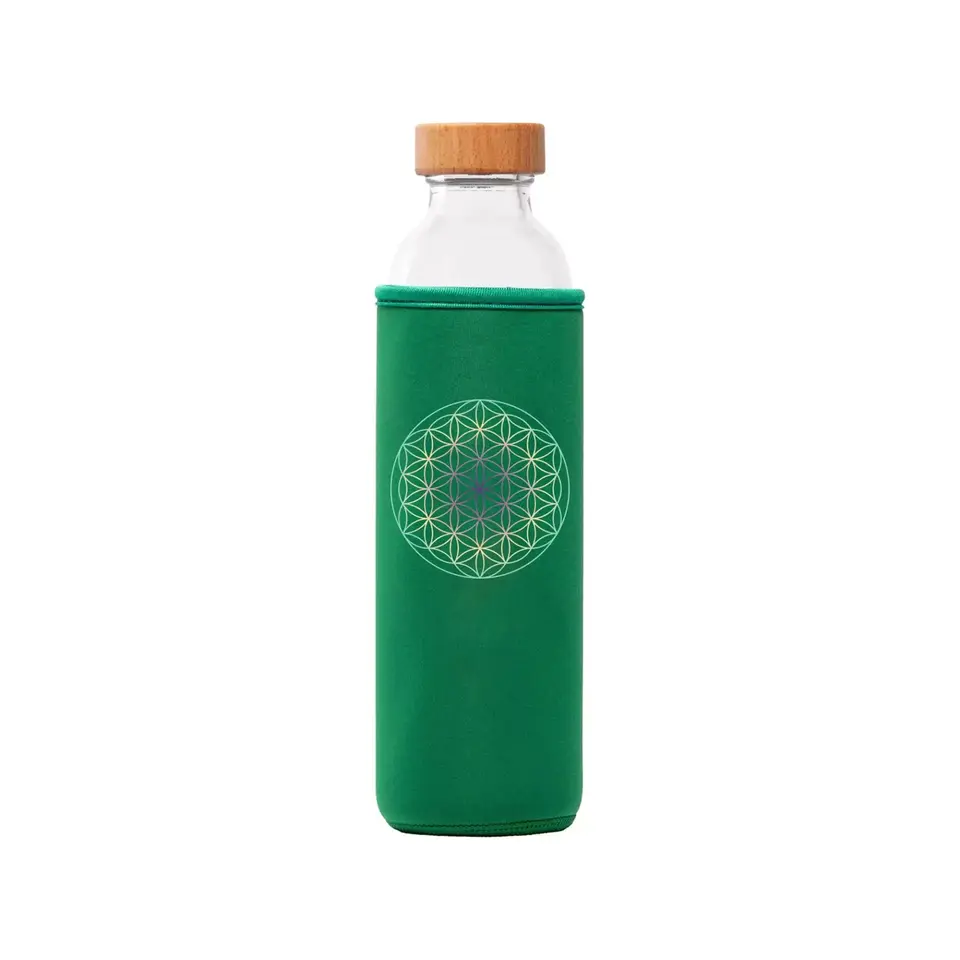 Glass bottle with wooden lid in green sleeve, geometric pattern on sleeve.
