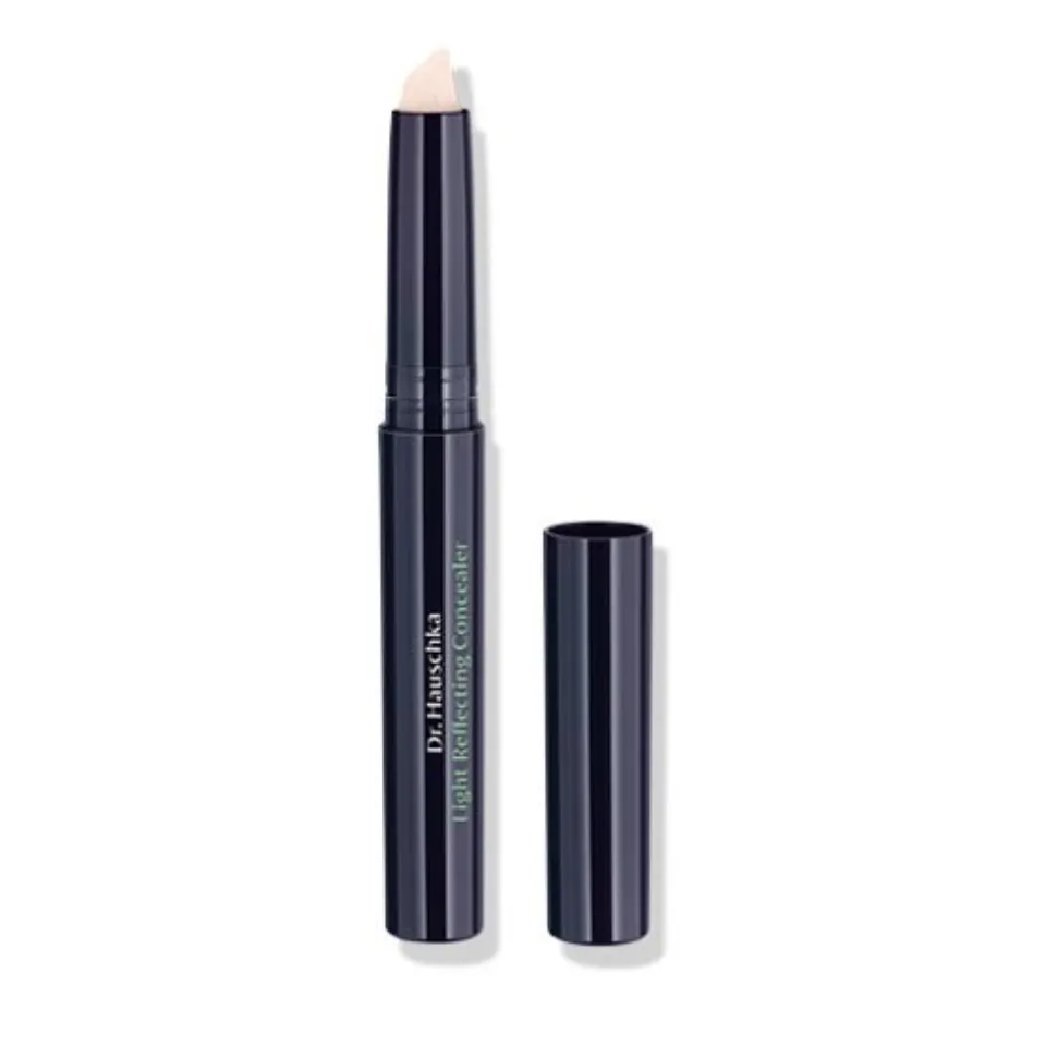 Dark tube of Dr. Hauschka Light Reflecting Concealer with cap removed.