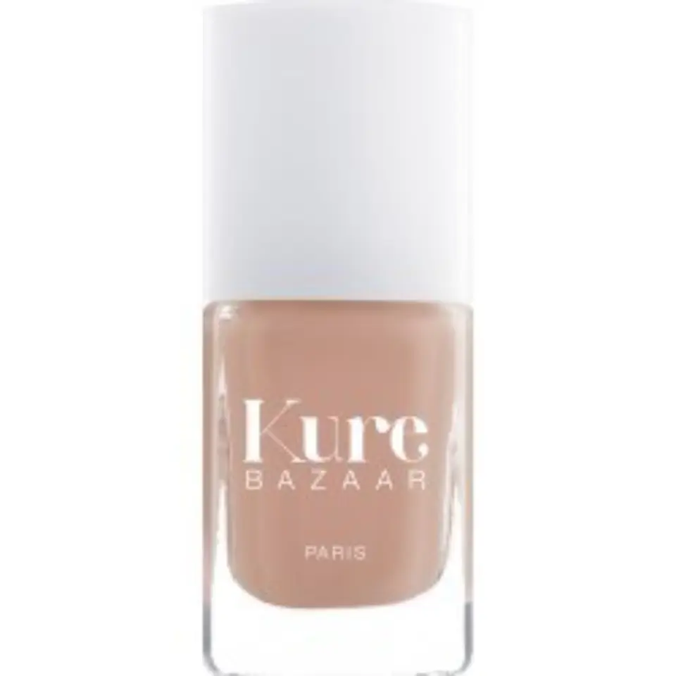 Kure Bazaar nail polish bottle with beige colour and white cap.