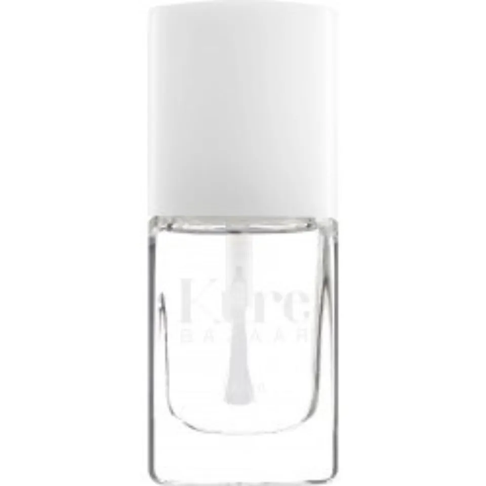 Clear nail polish bottle with white cap, labelled "Kure Bazaar".