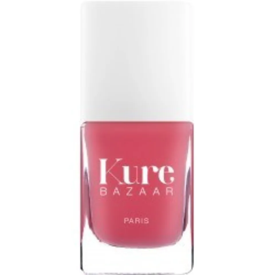 Kure Bazaar pink nail polish bottle with white cap.