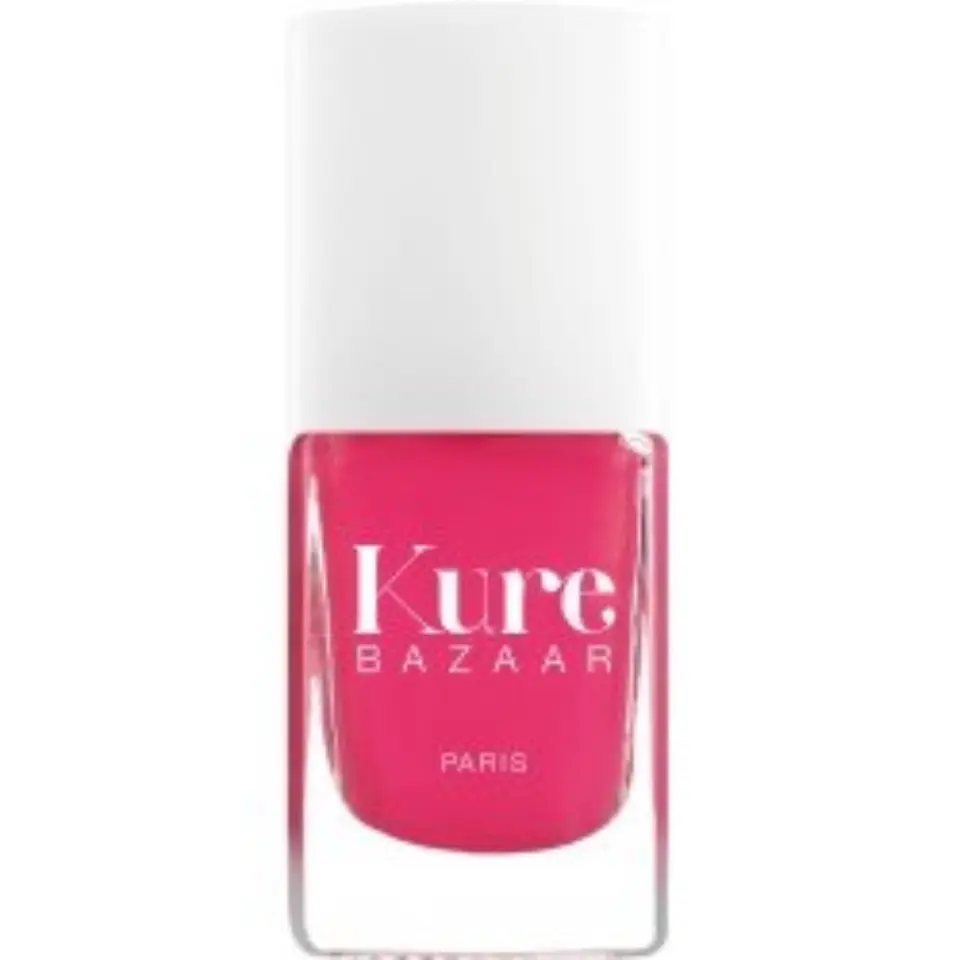Pink Kure Bazaar nail polish bottle with white cap, labelled "Paris".