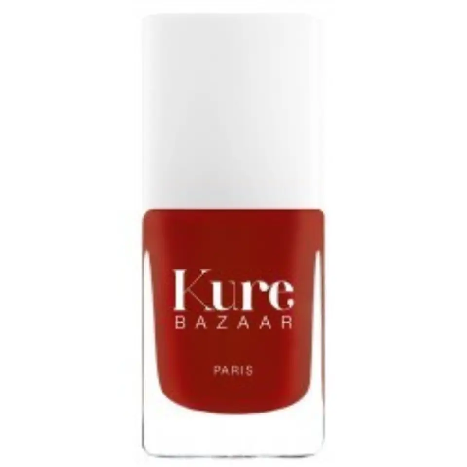 Kure Bazaar red nail polish bottle with white cap.